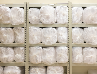 Linen Laundry Packaged On Shelves 1200X800